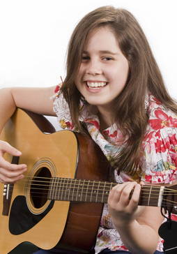 girl play the guitar, guitar lessons near me
